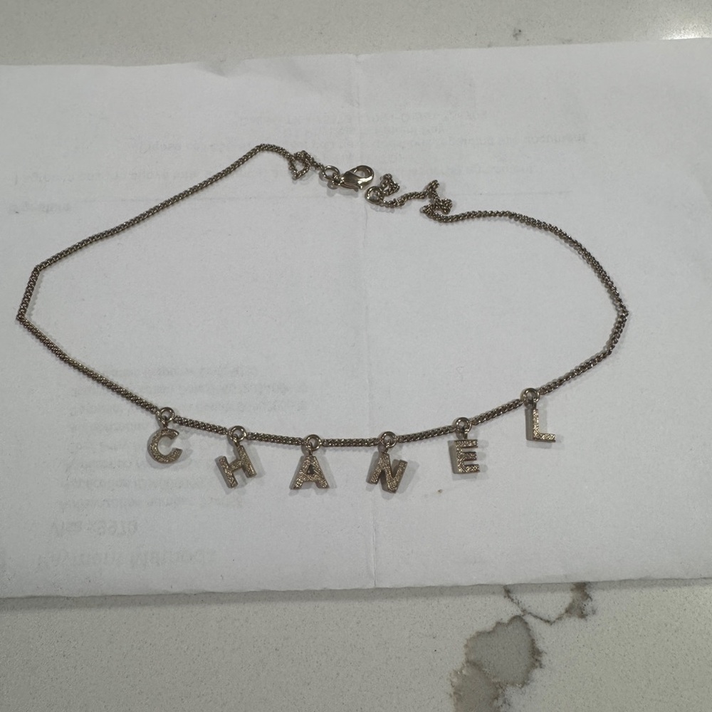 CHANEL Gold Letter Necklace